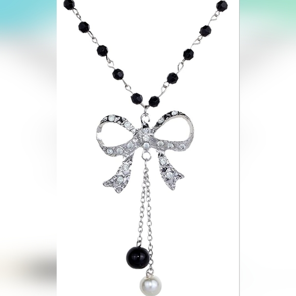 Silver plated black-and-white beaded crystal bow necklace - Picture 5 of 16